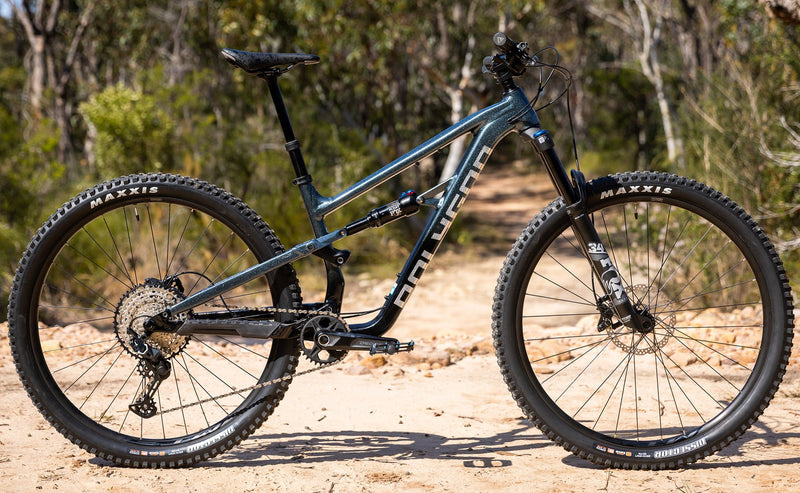 Polygon Siskiu T8 mountain bike on a trail
